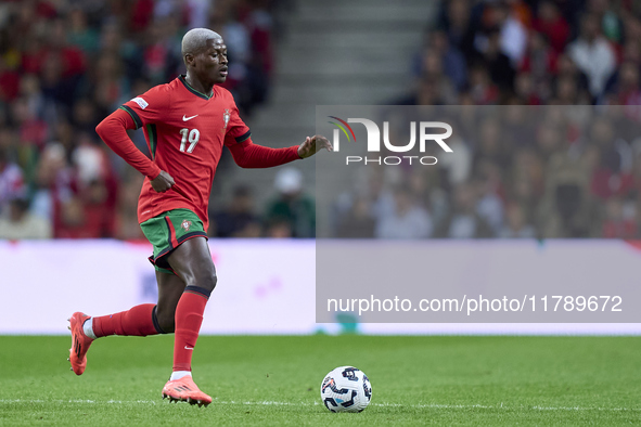 Nuno Mendes of Portugal is in action during the UEFA Nations League 2024/25 League A Group A1 match between Portugal and Poland at Estadio D...