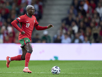 Nuno Mendes of Portugal is in action during the UEFA Nations League 2024/25 League A Group A1 match between Portugal and Poland at Estadio D...