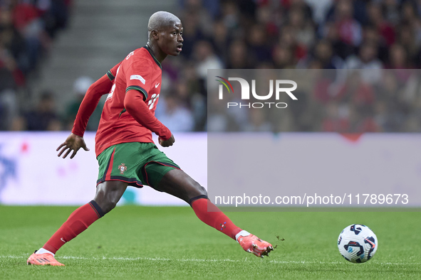 Nuno Mendes of Portugal is in action during the UEFA Nations League 2024/25 League A Group A1 match between Portugal and Poland at Estadio D...