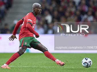 Nuno Mendes of Portugal is in action during the UEFA Nations League 2024/25 League A Group A1 match between Portugal and Poland at Estadio D...