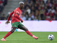 Nuno Mendes of Portugal is in action during the UEFA Nations League 2024/25 League A Group A1 match between Portugal and Poland at Estadio D...