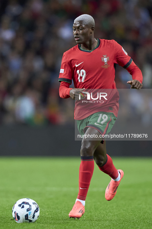 Nuno Mendes of Portugal is in action during the UEFA Nations League 2024/25 League A Group A1 match between Portugal and Poland at Estadio D...