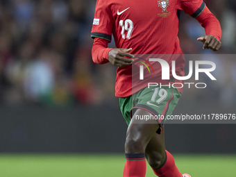 Nuno Mendes of Portugal is in action during the UEFA Nations League 2024/25 League A Group A1 match between Portugal and Poland at Estadio D...