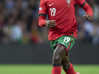 Nuno Mendes of Portugal is in action during the UEFA Nations League 2024/25 League A Group A1 match between Portugal and Poland at Estadio D...