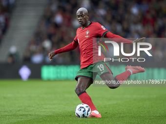 Nuno Mendes of Portugal is in action during the UEFA Nations League 2024/25 League A Group A1 match between Portugal and Poland at Estadio D...