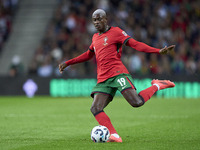 Nuno Mendes of Portugal is in action during the UEFA Nations League 2024/25 League A Group A1 match between Portugal and Poland at Estadio D...