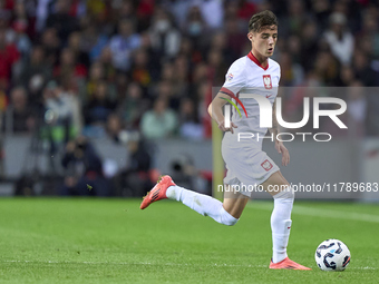 Kacper Urbanski of Poland plays during the UEFA Nations League 2024/25 League A Group A1 match between Portugal and Poland at Estadio Do Dra...