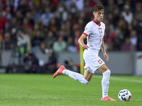 Kacper Urbanski of Poland plays during the UEFA Nations League 2024/25 League A Group A1 match between Portugal and Poland at Estadio Do Dra...