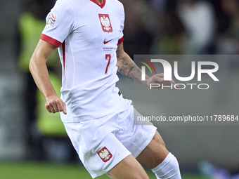 Kacper Urbanski of Poland plays during the UEFA Nations League 2024/25 League A Group A1 match between Portugal and Poland at Estadio Do Dra...