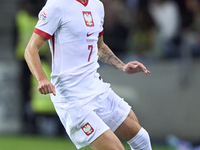 Kacper Urbanski of Poland plays during the UEFA Nations League 2024/25 League A Group A1 match between Portugal and Poland at Estadio Do Dra...