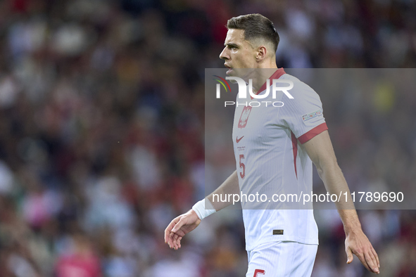 Jan Bednarek of Poland reacts during the UEFA Nations League 2024/25 League A Group A1 match between Portugal and Poland at Estadio Do Draga...