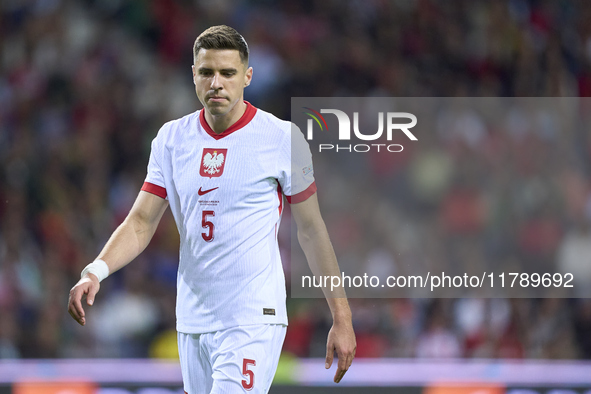 Jan Bednarek of Poland looks on during the UEFA Nations League 2024/25 League A Group A1 match between Portugal and Poland at Estadio Do Dra...