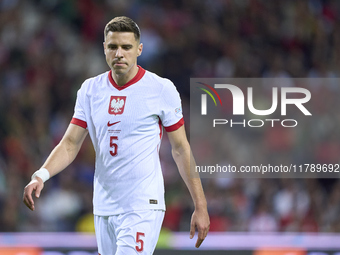 Jan Bednarek of Poland looks on during the UEFA Nations League 2024/25 League A Group A1 match between Portugal and Poland at Estadio Do Dra...