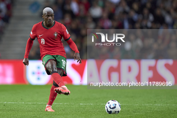 Nuno Mendes of Portugal is in action during the UEFA Nations League 2024/25 League A Group A1 match between Portugal and Poland at Estadio D...