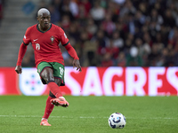 Nuno Mendes of Portugal is in action during the UEFA Nations League 2024/25 League A Group A1 match between Portugal and Poland at Estadio D...