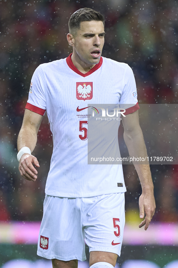 Jan Bednarek of Poland looks on during the UEFA Nations League 2024/25 League A Group A1 match between Portugal and Poland at Estadio Do Dra...