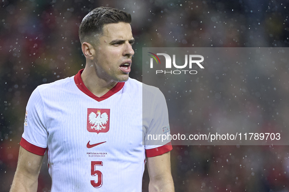 Jan Bednarek of Poland looks on during the UEFA Nations League 2024/25 League A Group A1 match between Portugal and Poland at Estadio Do Dra...