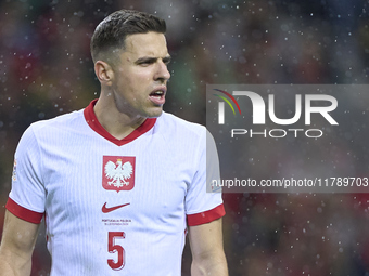 Jan Bednarek of Poland looks on during the UEFA Nations League 2024/25 League A Group A1 match between Portugal and Poland at Estadio Do Dra...