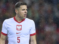 Jan Bednarek of Poland looks on during the UEFA Nations League 2024/25 League A Group A1 match between Portugal and Poland at Estadio Do Dra...