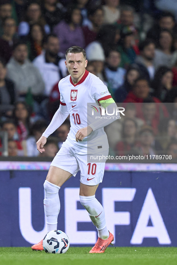 Piotr Zielinski of Poland is in action during the UEFA Nations League 2024/25 League A Group A1 match between Portugal and Poland at Estadio...