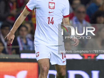 Jakub Kiwior of Poland is in action during the UEFA Nations League 2024/25 League A Group A1 match between Portugal and Poland at Estadio Do...