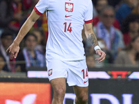 Jakub Kiwior of Poland is in action during the UEFA Nations League 2024/25 League A Group A1 match between Portugal and Poland at Estadio Do...