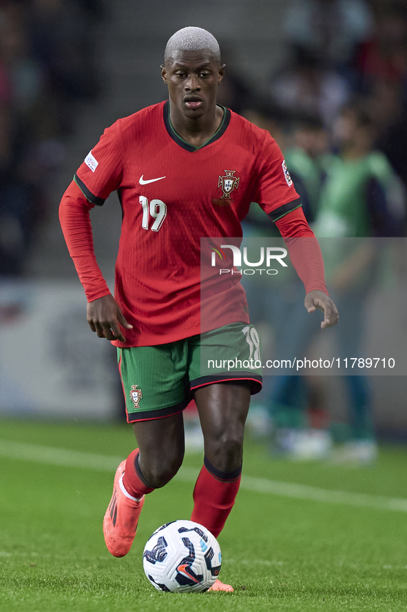 Nuno Mendes of Portugal is in action during the UEFA Nations League 2024/25 League A Group A1 match between Portugal and Poland at Estadio D...