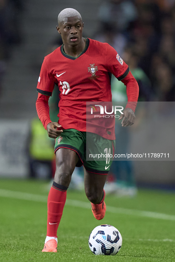 Nuno Mendes of Portugal is in action during the UEFA Nations League 2024/25 League A Group A1 match between Portugal and Poland at Estadio D...