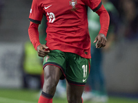 Nuno Mendes of Portugal is in action during the UEFA Nations League 2024/25 League A Group A1 match between Portugal and Poland at Estadio D...