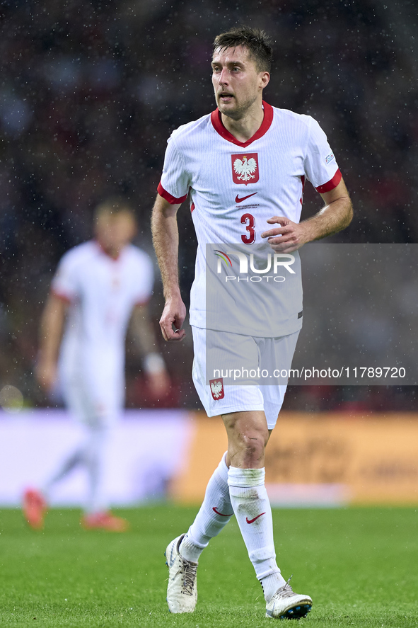 Taras Romanczuk of Poland reacts during the UEFA Nations League 2024/25 League A Group A1 match between Portugal and Poland at Estadio Do Dr...