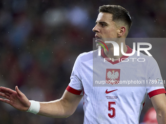 Jan Bednarek of Poland looks on during the UEFA Nations League 2024/25 League A Group A1 match between Portugal and Poland at Estadio Do Dra...