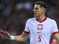 Jan Bednarek of Poland looks on during the UEFA Nations League 2024/25 League A Group A1 match between Portugal and Poland at Estadio Do Dra...