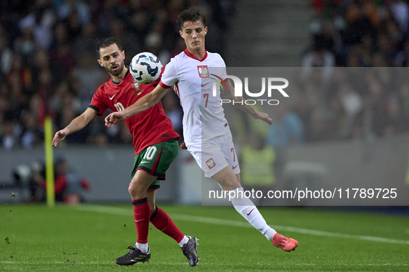 Bernardo Silva of Portugal competes for the ball with Kacper Urbanski of Poland during the UEFA Nations League 2024/25 League A Group A1 mat...