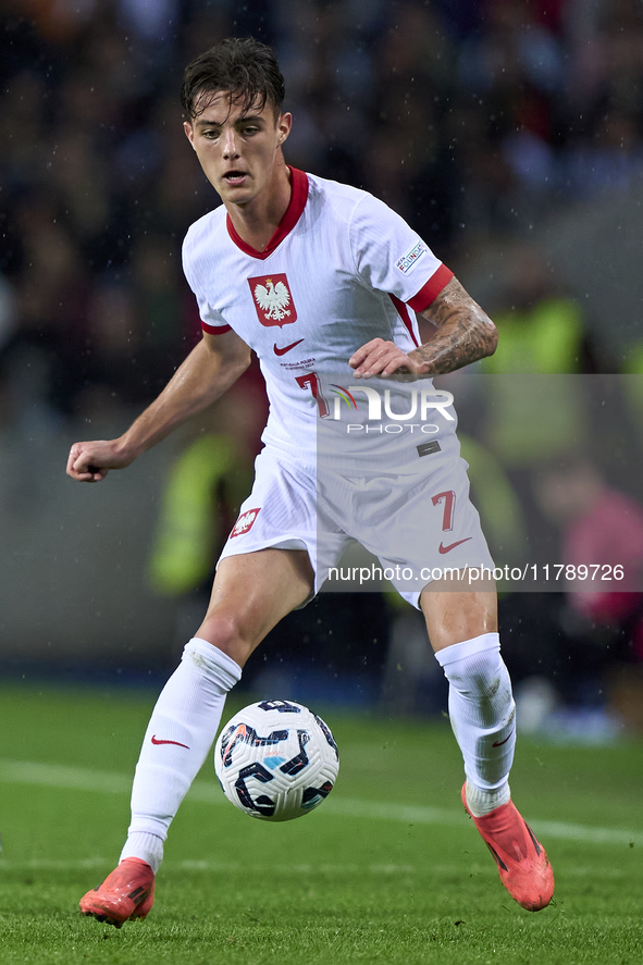 Kacper Urbanski of Poland plays during the UEFA Nations League 2024/25 League A Group A1 match between Portugal and Poland at Estadio Do Dra...