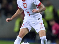 Kacper Urbanski of Poland plays during the UEFA Nations League 2024/25 League A Group A1 match between Portugal and Poland at Estadio Do Dra...