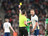 Harry Kane (9 England) receives a yellow card during the UEFA Nations League 2024/5, League B, Group B2 match between England and the Republ...