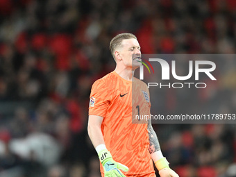 Goalkeeper Jordan Pickford of England pulls a face during the UEFA Nations League 2024/5, League B, Group B2 match between England and the R...