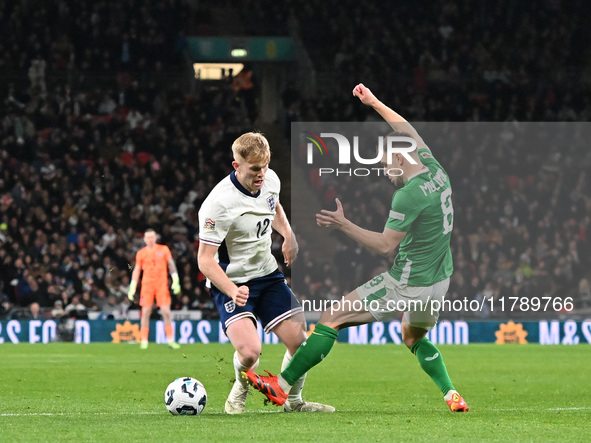 Lewis Hall (12 England) is challenged by Jayson Molumby (8 Republic of Ireland) during the UEFA Nations League 2024/5, League B, Group B2 ma...