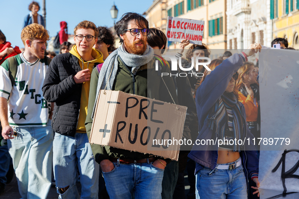 Approximately one thousand people, according to organizers, join a demonstration in Pisa, Italy, on November 15, 2024. The protest includes...