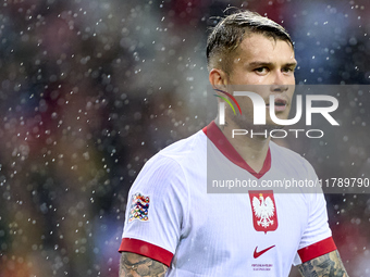 Kamil Piatkowski of Poland reacts during the UEFA Nations League 2024/25 League A Group A1 match between Portugal and Poland at Estadio Do D...