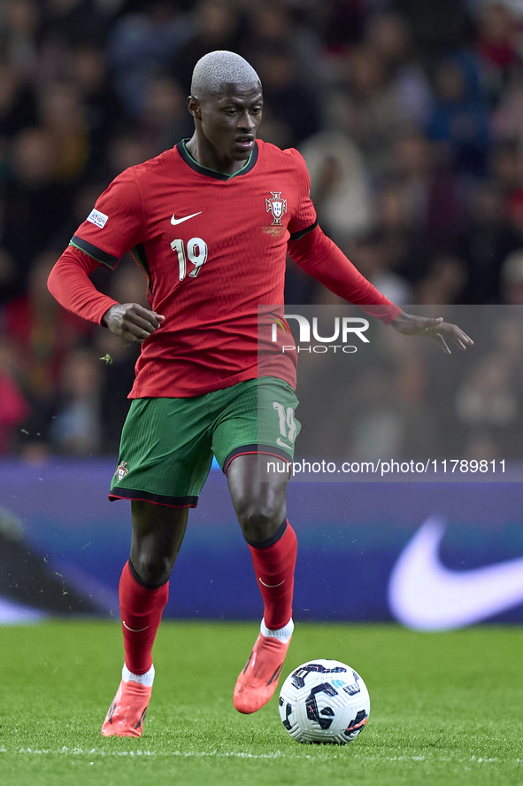 Nuno Mendes of Portugal is in action during the UEFA Nations League 2024/25 League A Group A1 match between Portugal and Poland at Estadio D...