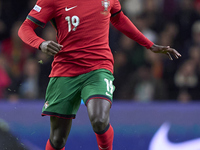 Nuno Mendes of Portugal is in action during the UEFA Nations League 2024/25 League A Group A1 match between Portugal and Poland at Estadio D...