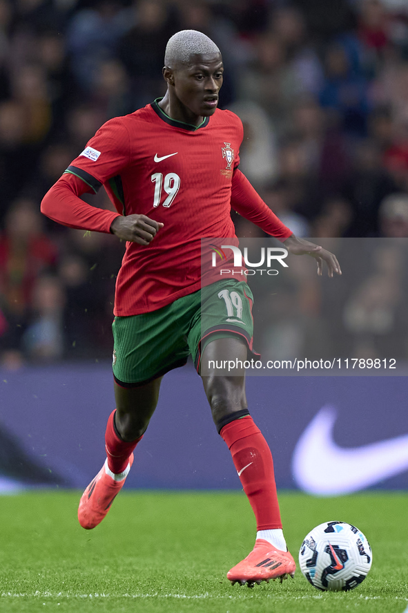 Nuno Mendes of Portugal is in action during the UEFA Nations League 2024/25 League A Group A1 match between Portugal and Poland at Estadio D...