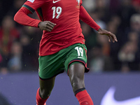 Nuno Mendes of Portugal is in action during the UEFA Nations League 2024/25 League A Group A1 match between Portugal and Poland at Estadio D...