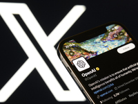 An editorial image shows an iPhone screen with OpenAI's personal account displayed on the X social network platform. (