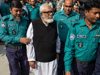 Police personnel escort detainee Salman F Rahman, former industry and investment adviser to the ousted Prime Minister of Bangladesh Sheikh H...