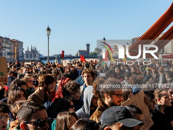 Approximately one thousand people, according to organizers, join a demonstration in Pisa, Italy, on November 15, 2024. The protest includes...