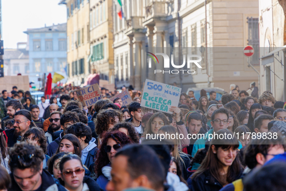 Approximately one thousand people, according to organizers, join a demonstration in Pisa, Italy, on November 15, 2024. The protest includes...