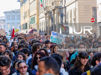 Approximately one thousand people, according to organizers, join a demonstration in Pisa, Italy, on November 15, 2024. The protest includes...