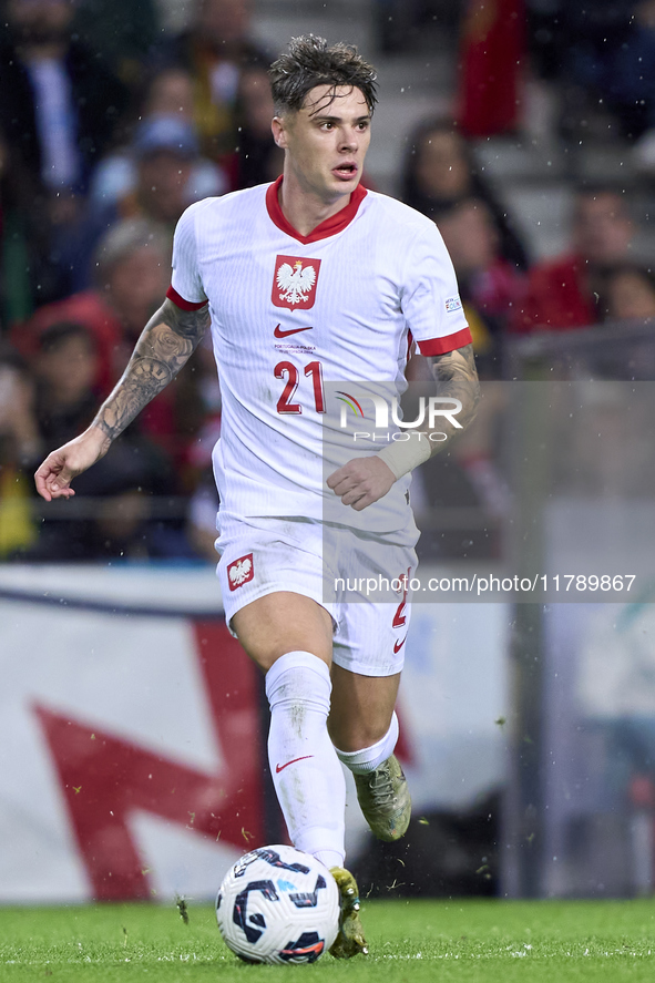 Nicola Zalewski of Poland is in action during the UEFA Nations League 2024/25 League A Group A1 match between Portugal and Poland at Estadio...